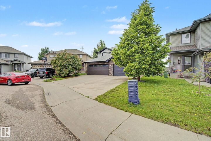 Property Photo:  5628 1A Avenue SW  AB T6X 0K9 
