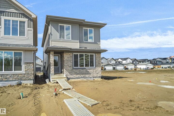 Property Photo: 19488 21 Avenue NW AB T6M 3M5