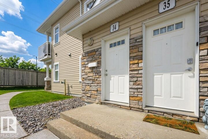 Property Photo: 1179 Summerside Drive SW 34 AB T6X 1K1