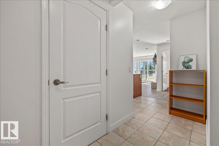 Property Photo:  12650 142 Avenue NW 114  AB T5X 0J5 