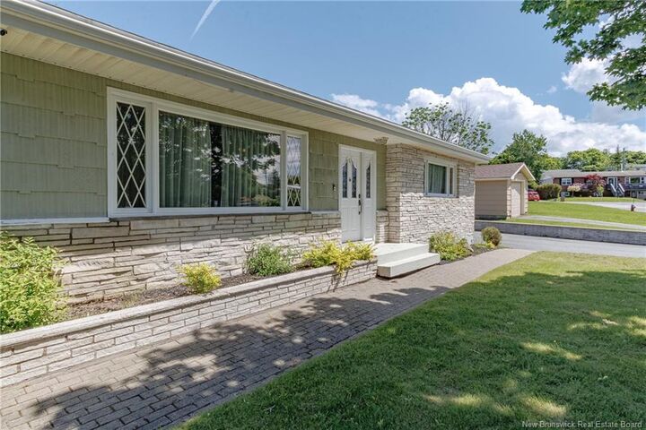 Property Photo:  92 Greendale Crescent  NB E2M 4L6 