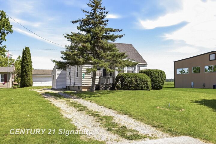 Property Photo:  6737 Dixie Highway  MI 48722 