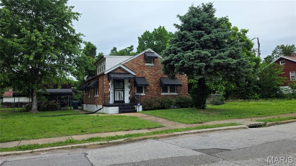 Property Photo:  3801 Avondale Avenue  MO 63121 