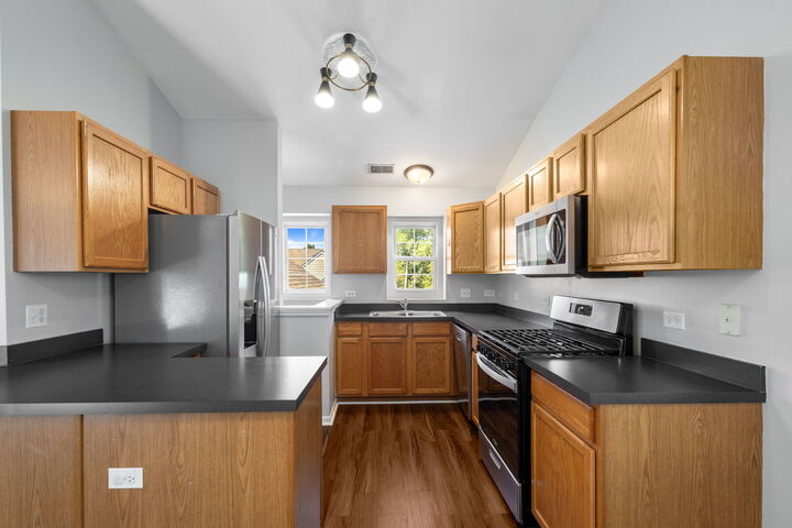 Property Photo:  2827 Rutland Circle 204  IL 60564 