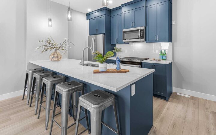 Property Photo: 255 Rowmont Boulevard NW 1703 AB T3L 0M2