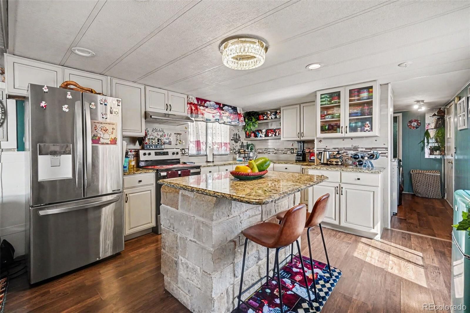 Property Photo: 6825 W Mississippi Avenue CO 80226