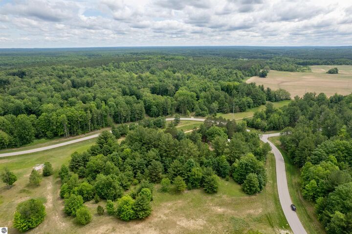 Property Photo:  5502 Paradise Ranch  MI 49649 