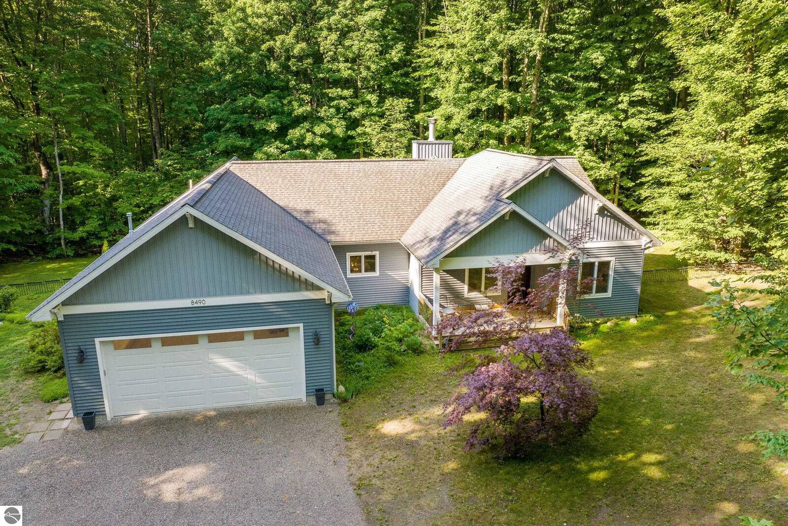 Property Photo:  8490 Reynolds Road  MI 49684 