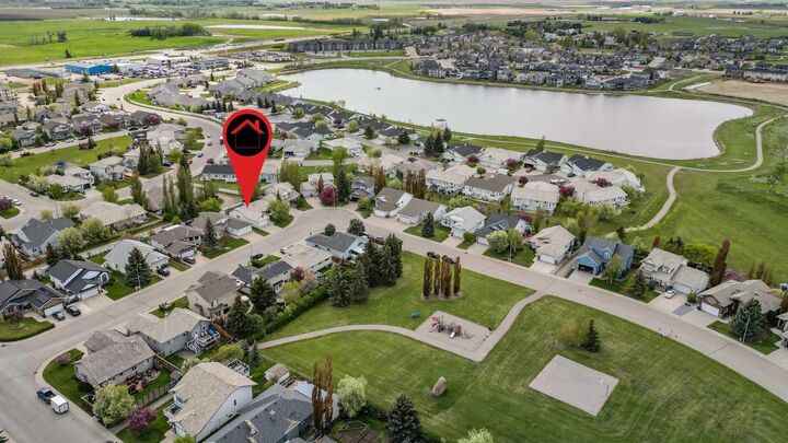 Property Photo: 11 Strathmore Lakes Crescent AB T1P 1L7