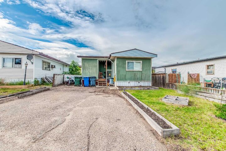 Property Photo:  223 Fairchild Street SW  AB T1A 7Z6 