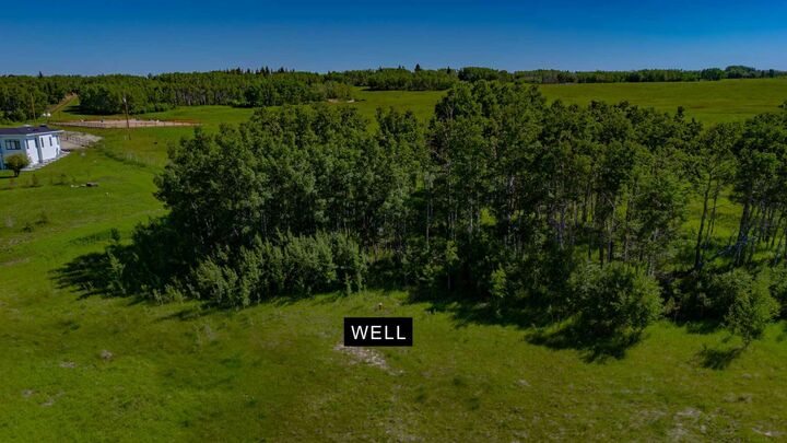 Property Photo: 32103 Badger Road AB T4C 1A2