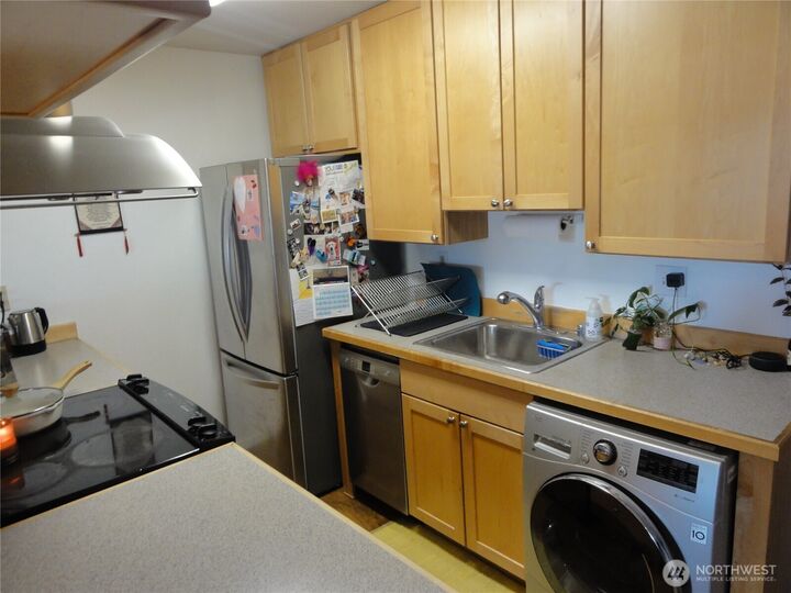 Property Photo:  22993  Marine View Drive S D306  WA 98198 