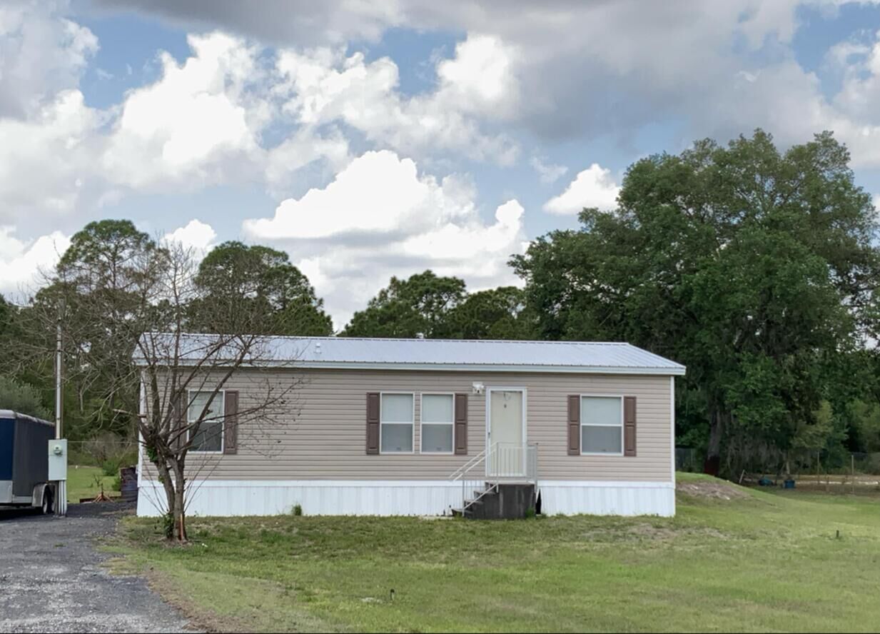 Property Photo:  220 N Sendero Street  FL 33440 