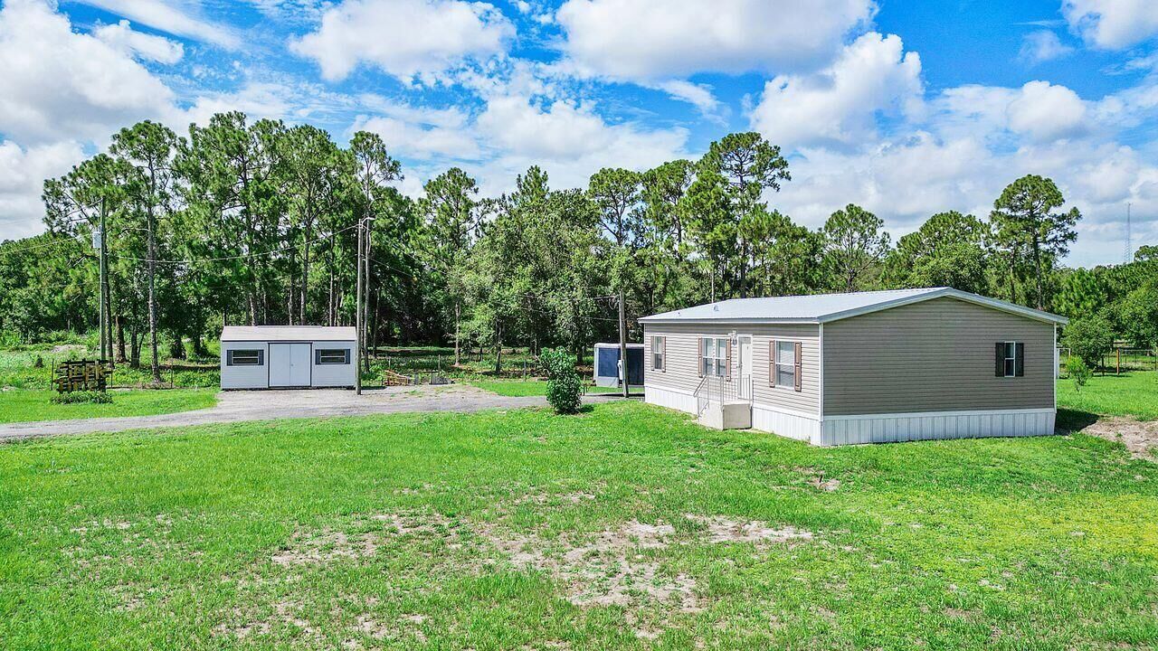 Property Photo:  220 N Sendero Street  FL 33440 