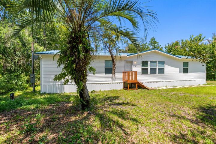 Property Photo:  6847 Woodsman Drive  FL 33544 
