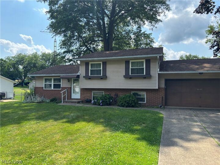 Property Photo:  8597 Elmfield Street NW  OH 44614 
