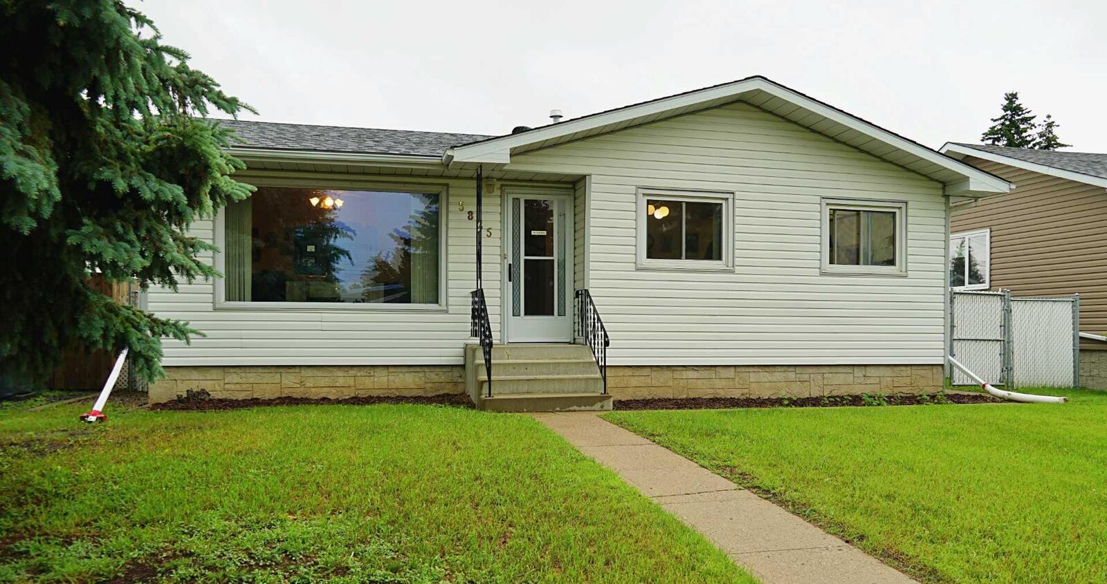 Property Photo:  5825 51 Street  AB T9C 1H9 