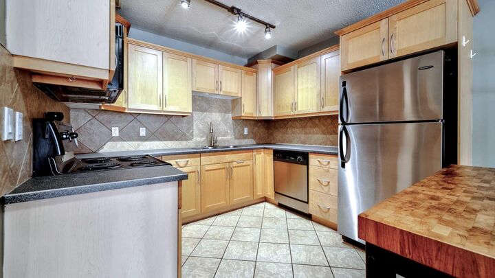 Property Photo:  1813 25 Avenue SW 22  AB T2T 1A4 