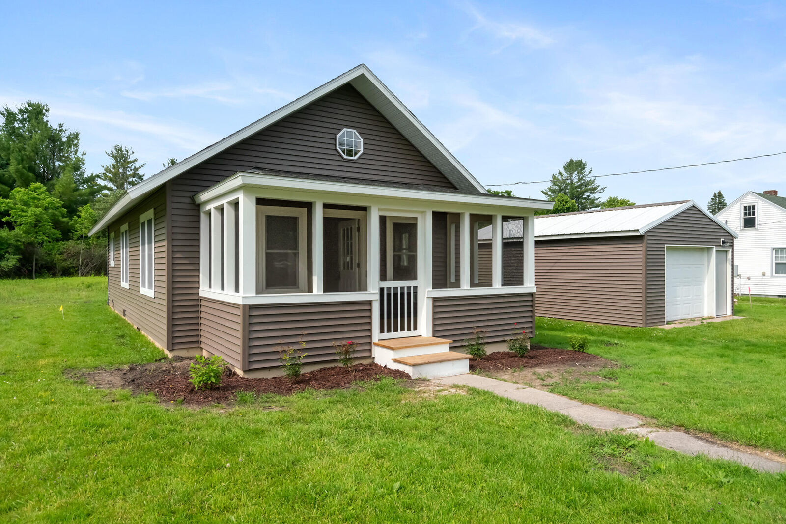 Property Photo: 6066 Hemlock Street MI 49749