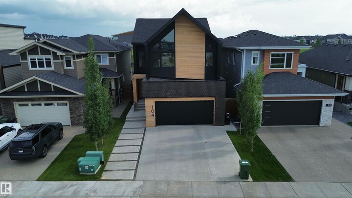 Property Photo: 104 Edgewater Circle AB T9E 1K5