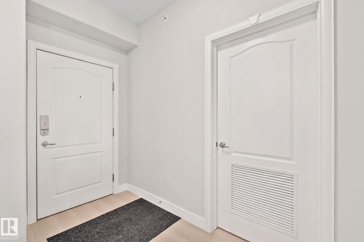 Property Photo: 1406 Hodgson Way NW 432 AB T6R 3K1
