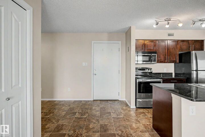 Property Photo: 1080 McConachie Boulevard NW 404 AB T5Y 0K8