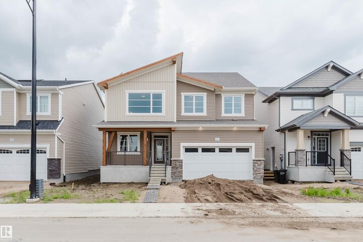 Property Photo: 1523 206 Street NW AB T6M 2X6