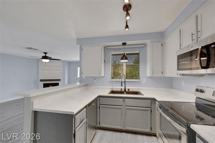 Property Photo:  6869 Tamarus Street 202  NV 89119 