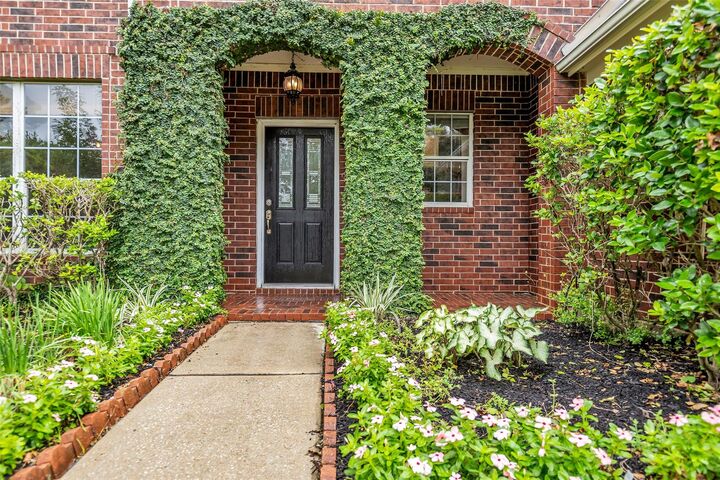 Property Photo: 22402 Rue Canyon Court TX 77450