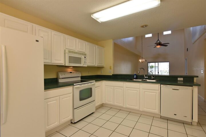 Property Photo:  2203 Cypress Knee Loop  FL 34743 