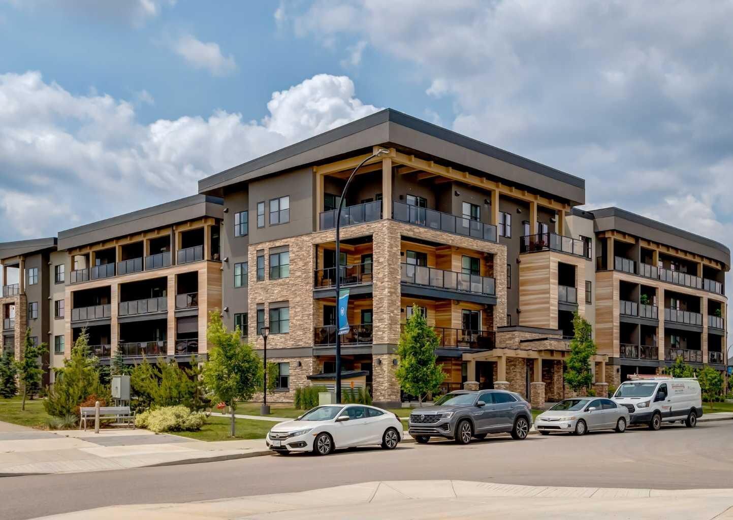 Property Photo: 125 Wolf Hollow Crescent SE 408 AB T2X 5W9