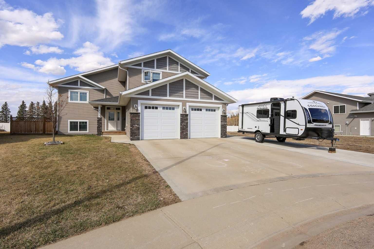 Property Photo: 137 Coachman Way AB T4M 0B4