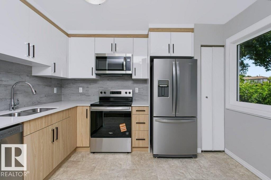 Property Photo: 14511 52 Street NW 24 AB T5A 4M6
