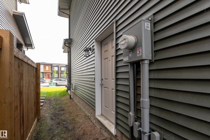 Property Photo: 1457 Keswick Drive SW AB T6W 4Y8