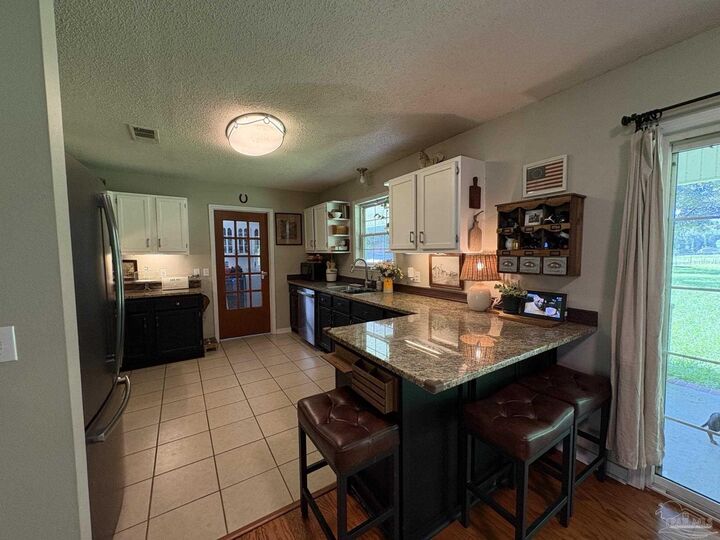 Property Photo:  6541 Stubbs Rd  FL 32570 