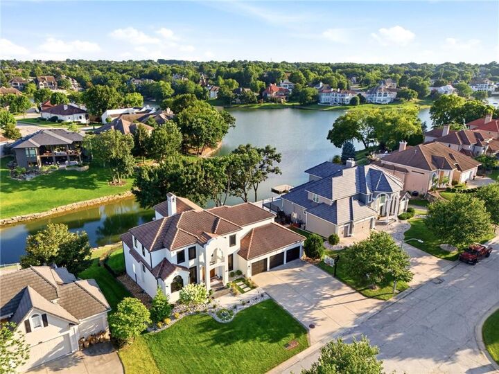 Property Photo:  701 NE Shoreline Drive  MO 64064 