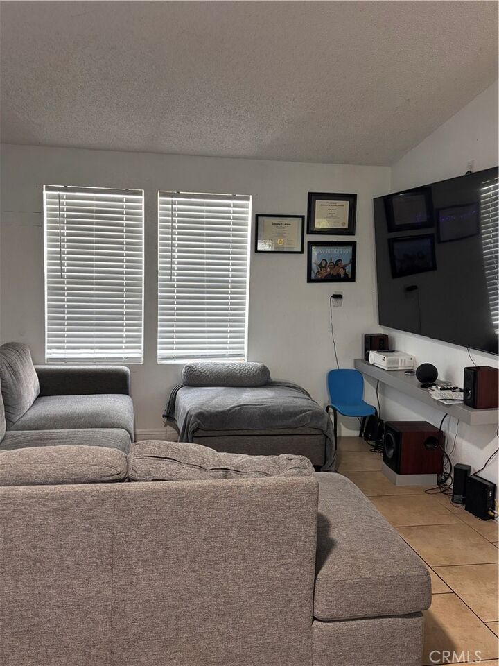 Property Photo: 1855 E Riverside Drive E 209 CA 91761
