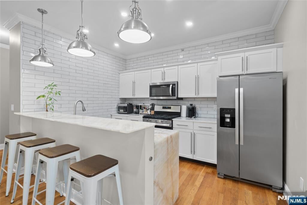 Property Photo:  5501 Hudson Avenue 407  NJ 07093 