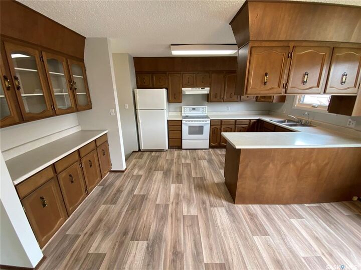 Property Photo: 58 Stewart Crescent SK S3N 3J5