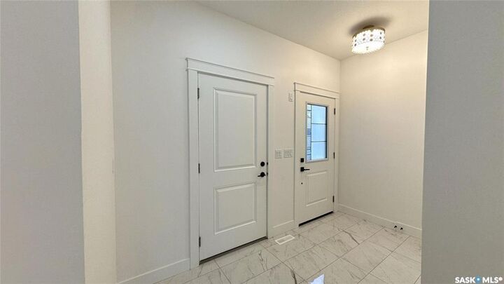 Property Photo: 355 Nazarali Way SK S7V 1X9
