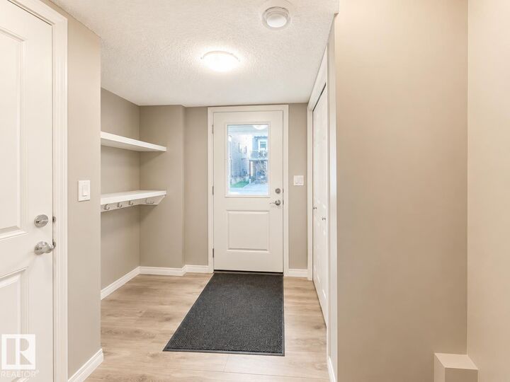 Property Photo:  20104 19 Avenue NW  AB T6M 0X9 