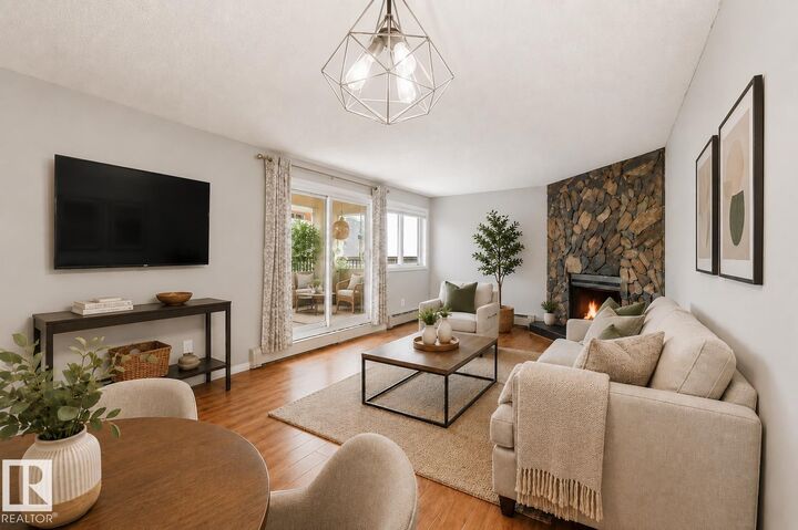 Property Photo:  10138 116 Street NW 107  AB T5K 1V8 