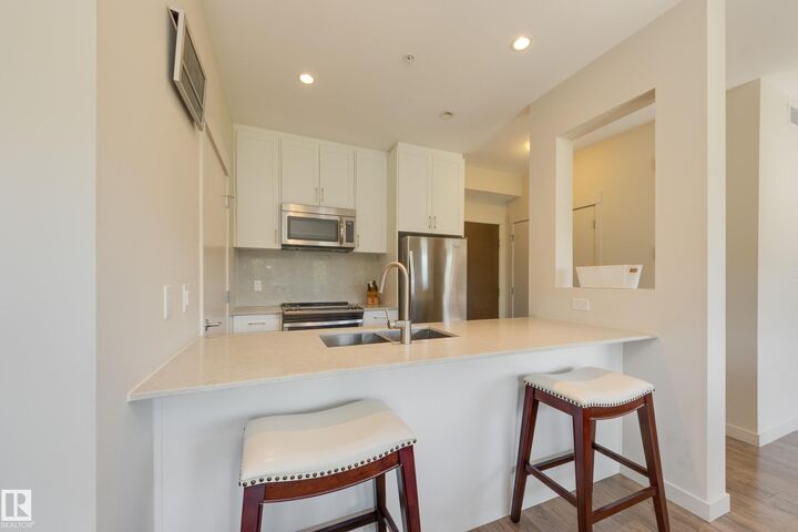 Property Photo: 5 St Louis Street 405 AB T8N 7T2