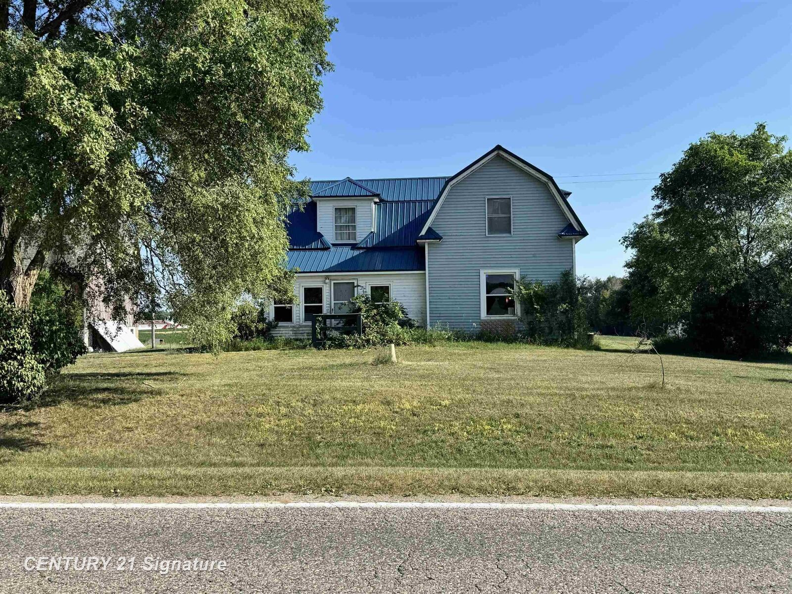 Property Photo:  5732 E Grass Lake Road  MI 48617 
