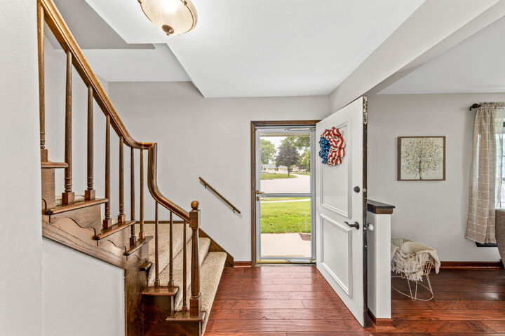 Property Photo:  128 Audubon Ct  WI 53024 