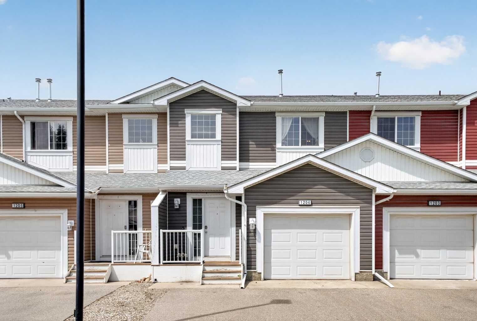 Property Photo: 800 Yankee Valley Boulevard SE 1204 AB T4A 2L2