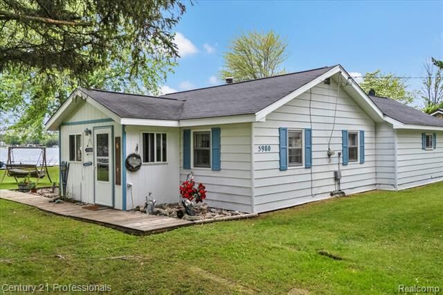 Property Photo:  5980 Birchwood Drive  MI 48739 