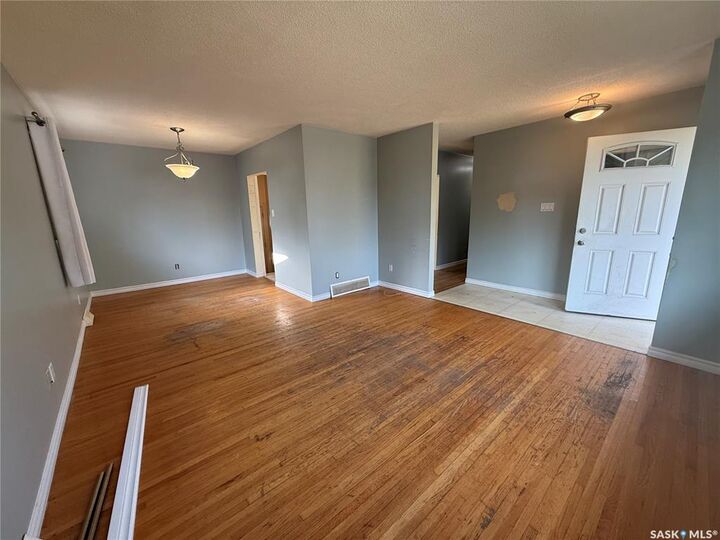 Property Photo: 68 Wentworth Crescent SK S7L 4A9