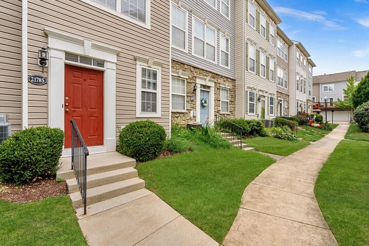 Property Photo: 21785 Dragons Green Square VA 20147