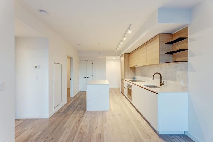 Property Photo:  10448 University Drive 4xx  BC V3T 0S7 